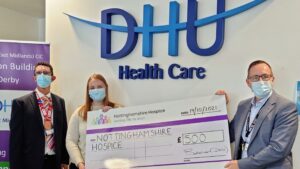 DHU presenting cheque to Nottinghamshire Hospice