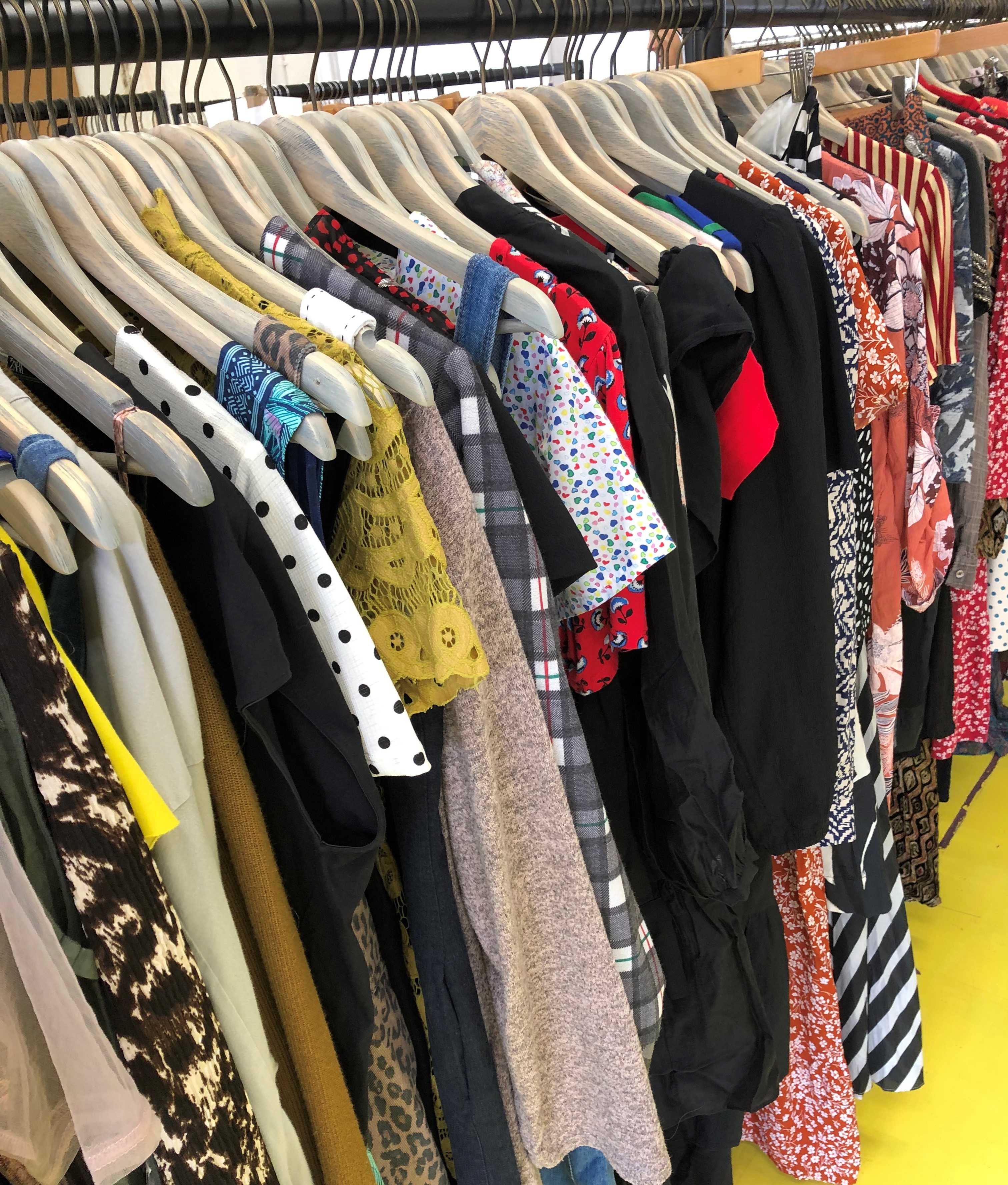 Clothes on rails at the Big Style Swap