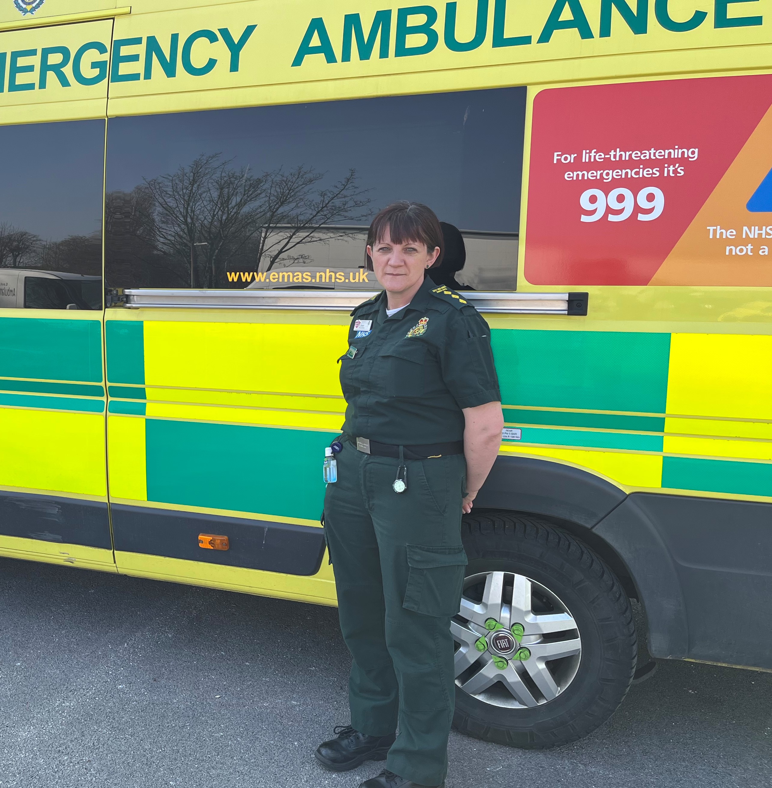 Suzie Matthews, EMAS, with an ambulance