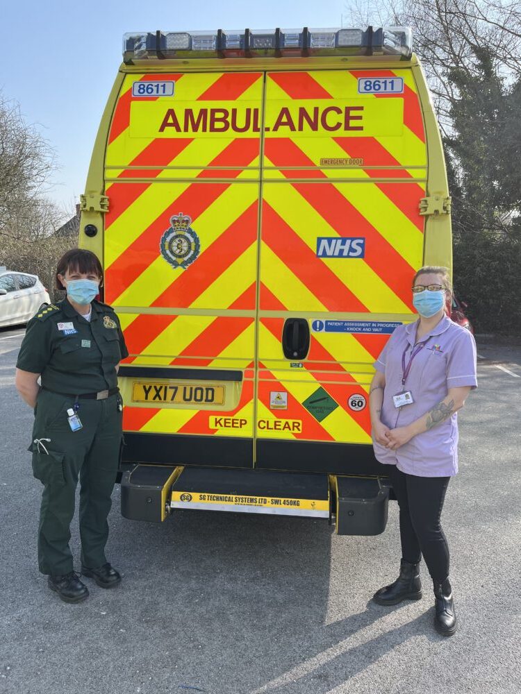 EMAS and hospice staff with ambulance