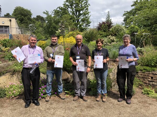 group of volunteers with their certificates