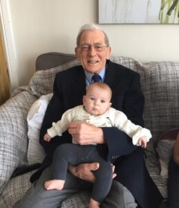Norman with grandchild